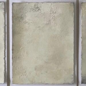 Three abstract beige textured paintings.